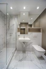 Think in advance when planning your renovation project A bathroom with wall and floor tiles