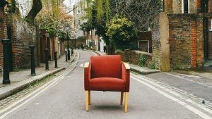 Don't leave unpacking your furniture for the end Chair in road