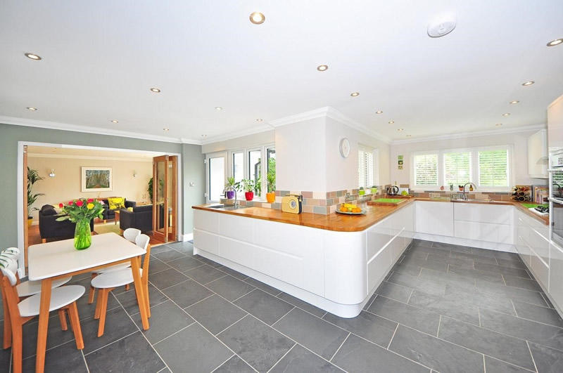 The second most common place where people have underfloor heating is the kitchen A kitchen with tiles on the floor
