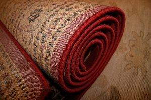 The best way to protect carpets during a big remodeling job is to move them to a storage unit until the remodeling is done. rolled up rug image