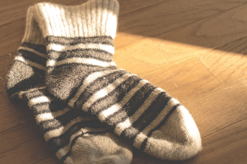 Pros of underfloor heating Socks Image